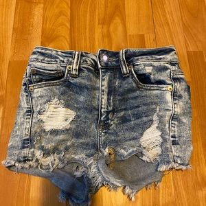 Blue washed and ripped jean shorts